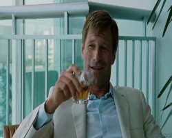 Aaron Eckhart consuming alcohol